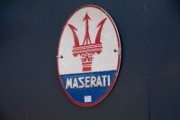 MASERATI: A modern cast iron oval shaped Maserati sign, 30cm high, 20cm wide - 2