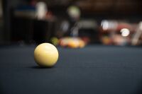 POOL TABLE: A pool / billiard table complete with triangles, pool balls, billiard balls, scoreboard, overhead lamp, cues & cue rack and table cover, thought to a nine foot tournament sized table - 5