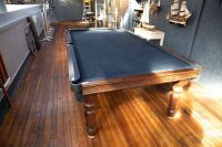 POOL TABLE: A pool / billiard table complete with triangles, pool balls, billiard balls, scoreboard, overhead lamp, cues & cue rack and table cover, thought to a nine foot tournament sized table - 12