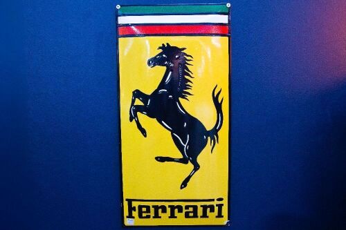 FERRRAI: A modern enamel convex Ferrari sign, 60cm high, 29cm wide