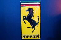 FERRARI: A modern enamel convex Ferrari metal sign, 60cm high, 29cm wide
