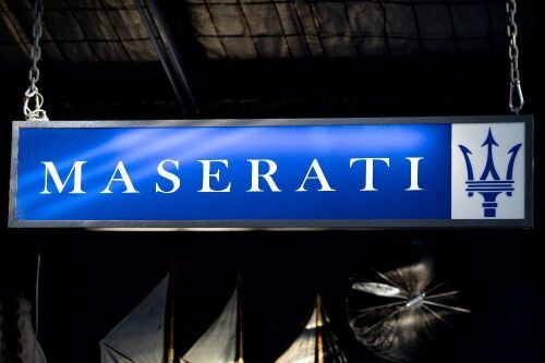 MASERATI: A modern acrylic illuminated double sided dealership style Maserati sign, 38cm high, 185cm wide
