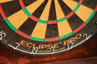 DARTBOARD / CASINO: A dartboard game fitted in timber case, with two opening doors & one drawer for darts, case 80cm high, 60cm wide, 22cm deep together with a casino kit - 3