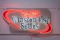 NASCAR: A large modern 'Nascar - Winston Cup Series' illuminated sign, 100cm high, 195cm wide