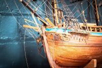 MODEL SHIP: A timber c1700s Royal Navy ship model, two mast with British Ensign flag (name unknown) on base, 63cm high from base, 75cm wide - 5