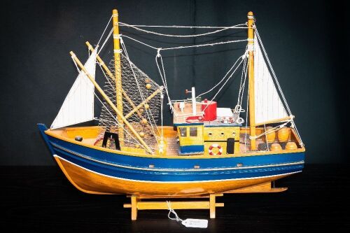 FISHING BOAT: A small timber model fishing boat on base, 38cm high from base, 45cm wide