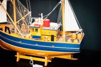 FISHING BOAT: A small timber model fishing boat on base, 38cm high from base, 45cm wide - 2