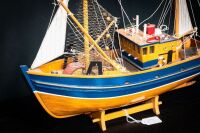 FISHING BOAT: A small timber model fishing boat on base, 38cm high from base, 45cm wide - 3