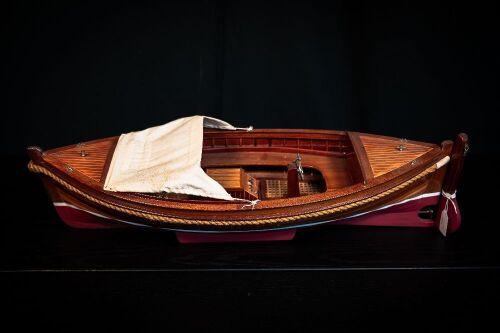 TUCKERBOOT: A timber 'tuckerboot' style model boat, 13cm high, 70cm wide