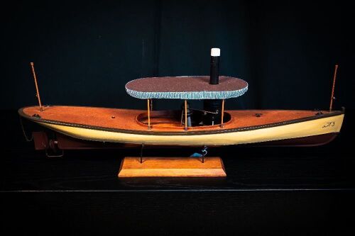 STEAM LAUNCH: A timber model steam launch style boat on base, 30cm high from base, 70cm wide