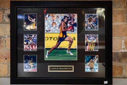LANCE FRANKLIN: A Lance Franklin (Hawthorn F.C) display piece, features seven Photos of Franklin with centre photo signed by Franklin, 49cm high, 58cm wide