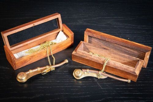 WHISTLES: Two modern Boatswains whistles each in fitted timber boxes, both 13cm long