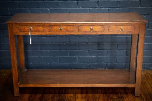 HALL TABLE: A dark timber hall style table with four small drawers, 130cm long, 78cm high & 39cm deep