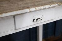 TABLE: One small rustic looking table with one drawer, mostly painted white, 80cm long, 76cm high & 56cm deep - 3