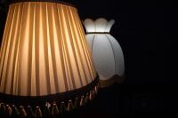 LAMPS: Two timber standing lamps with fabric shades, one with built in table, tallest 180cm high - 2