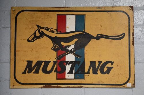 FORD MUSTANG: Five Ford Mustang display items, includes one wall clock in the form of wheel & tyre and four modern metal signs, largest 40cm high, 60cm wide