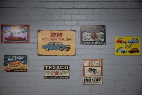 GARAGE SIGNS: Eight small metal garage signs