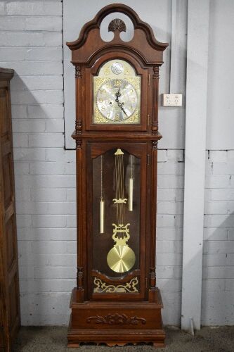 CLOCK: A modern veneer long case clock with weights & hanging pendulum, mechanism branded Tempus Fugit, chiming mechanism untimed, 205cm high