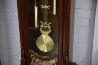 CLOCK: A modern veneer 31-day long case clock with hanging pendulum & weights, mechanism branded Tempus Fugit, chiming mechanism, 205cm high - 3