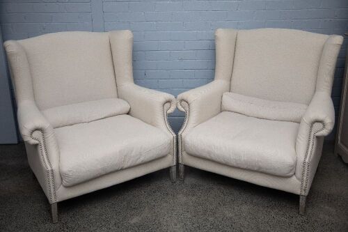 ARMCHAIRS: Two large linen covered Hamptons style armchairs, made by Villa Maison (China), 108cm high, 113cm wide, 75cm deep, both have minor staining