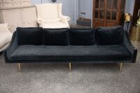 COUCH: A long black cloth four person couch, approx 230cm long