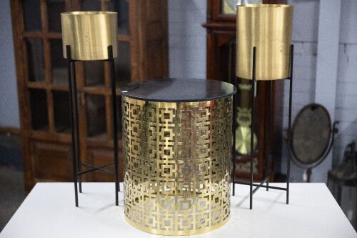 PLANTERS: Two gold toned planters and one side table, tallest planter 75cm high, table 47cm high