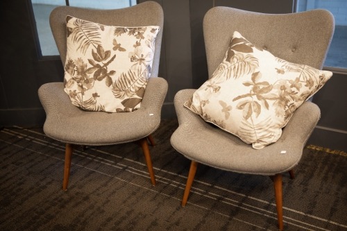 ARMCHAIRS: Two light grey armchairs with timber legs, made by Matt Blatt, 93cm high, 70cm wide