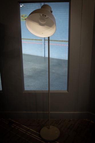 LAMP: An industrial style floor lamp in grey, 185cm high