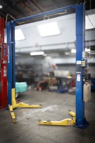 HOIST: A Hanmechson Pro-9D four tonne two post vehicle hoist