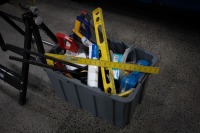 HARDWARE: A tub of assorted hardware items, includes such items as a planer, saws, quick grips, hammers, etc - 2