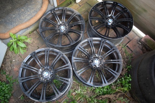 BMW: A set of staggered BMW black alloy wheels, no size or part number stamped visible, measured size 19.5 inch x 9.5 inch -8.5 inch
