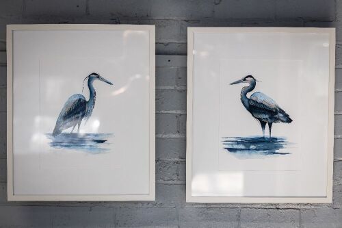 PRINTS: Two decorative prints featuring blue Heron birds produced by La Grolla (Australia), image 40cm high, 30cm wide