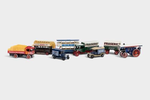 MATCHBOX: A group of seven Matchbox models, including agricultural vehicles, buses, and vans