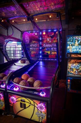 SHOOTING HOOPS: A 'c2022 Shooting Hoops' basketball amusement machine, made by Sega, machine functional (Note Description)