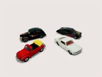 MODEL CARS: Four 1:64 scale models by Tomica, Matchbox and Hot Wheels [Location: Sydney]