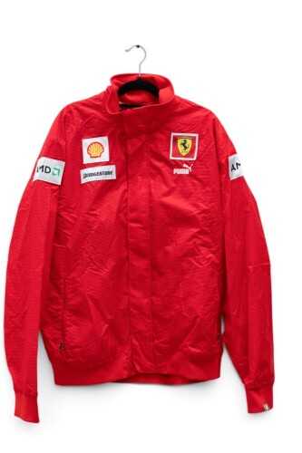 FERRARI An official Ferrari product Puma outerwear jacket with Shell, Bridgestone & AMD patches, appears to be unworn, size US XXL [Location: Melbourne]