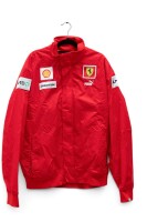 FERRARI An official Ferrari product Puma outerwear jacket with Shell, Bridgestone & AMD patches, appears to be unworn, size US XXL [Location: Melbourne]