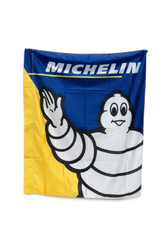 MICHELIN: A Michelin 'waving Bibendum' flag, 137cm high, 113cm wide, appears unused [Location: Melbourne]