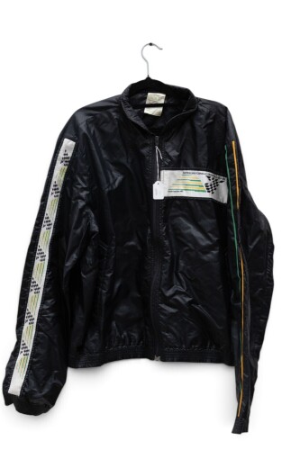 ADELAIDE GP: A jacket from the inaugural 1985 Adelaide Formula One Grand Prix made by Sunbuster Sportswear, size extra large [Location: Melbourne]