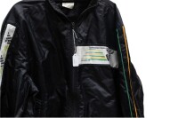 ADELAIDE GP: A jacket from the inaugural 1985 Adelaide Formula One Grand Prix made by Sunbuster Sportswear, size extra large [Location: Melbourne] - 2
