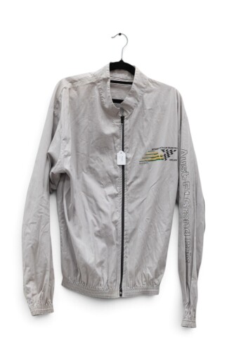 251 · ADELAIDE GP: A jacket from the inaugural 1985 Adelaide Formula One Grand Prix with 'Adelaide Alive' graphic on rear [Location: Melbourne]