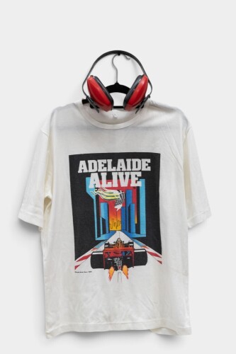 ADELAIDE GP: A commemorative t-shirt from the inaugural 1985 Adelaide Grand Prix together with a pair of protective ear muffs [Location: Melbourne]