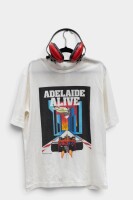 ADELAIDE GP: A commemorative t-shirt from the inaugural 1985 Adelaide Grand Prix together with a pair of protective ear muffs [Location: Melbourne]