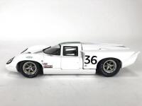 LOLA: 1:18 scale Denny Hulme Lola T70 Mark III Cope produced by GMP. (NB description) - 6