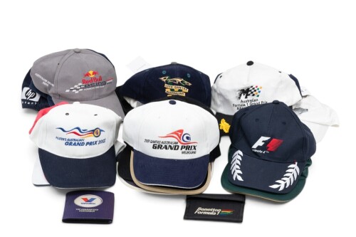 HATS: A group of assorted hats, includes mostly Adelaide & Melbourne GP hats & some team hats [Location: Melbourne]