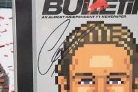 LEWIS HAMILTON: A Lewis Hamilton display piece, features two photographs, a signed 'The Red Bulletin' magazine from 2008 and a achievements plaque, 56cm high, 85cm wide [Location: Melbourne] - 3