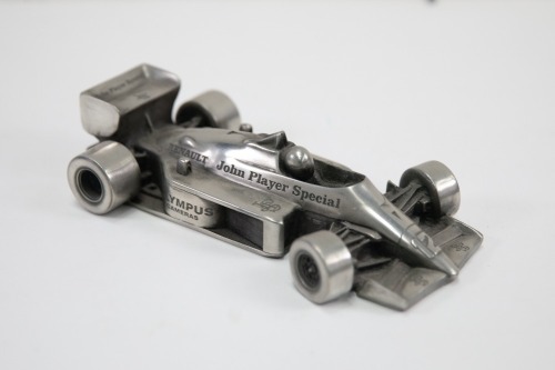 AYRTON SENNA: A pewter Compulsion Gallery JPS Lotus-Renault 97T or 98T Ayrton Senna ornamental piece, 23cm long [Location: Melbourne]