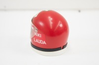 NIKI LAUDA: A small commemorative Niki Lauda helmet with Heuer analog clock inside, 12cm high [Location: Melbourne] - 2