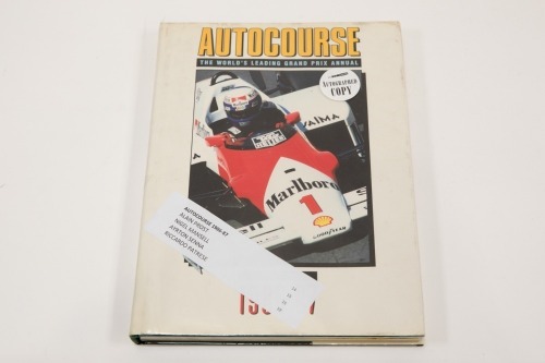 AUTOCOURSE: A signed copy of 'Autocourse' edition 1986-87, signed by Ayrton Senna, Nigel Mansell, Alain Prost & Riccardo Patrese [Location: Melbourne]