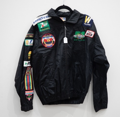 AUSTRALIAN GP: A jacket with numerous c1980s cloth patches mostly from the Australian Grand Prix in Adelaide & Melbourne, also has patches from F1 teams [Location: Melbourne]